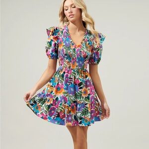 NWT Sugarlips Santa Elena Leones Floral Smocked
Mini Dress. Size XL. Retail $95